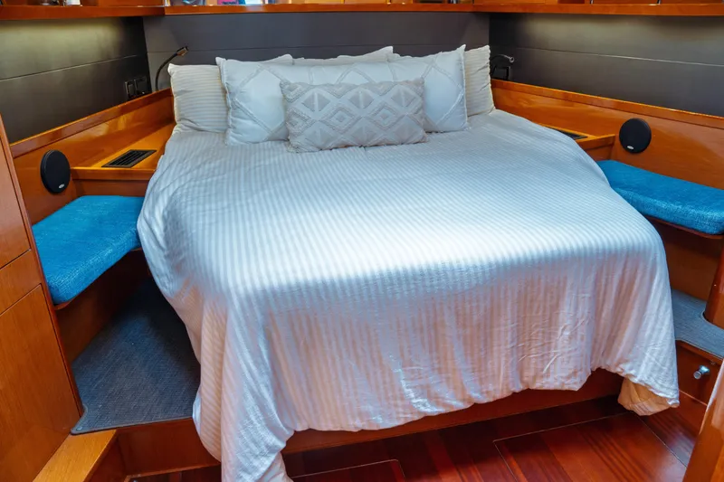 Slide: The Image of Luxurious cabin interior of 2016 Beneteau Oceanis 60 yacht with cozy bedding. - 13