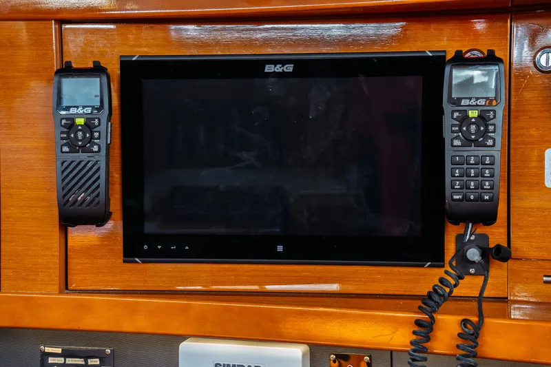 Slide: The Image of B&G navigation system on 2016 Beneteau Oceanis 60 yacht, featuring dual handheld devices. - 29