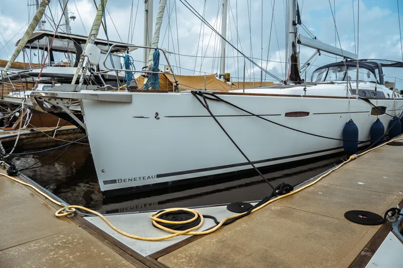 Slide: The Image of 2016 Beneteau Oceanis 60 yacht docked at marina, side view. - 3