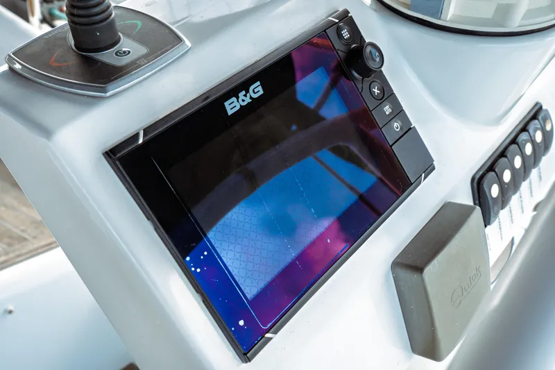 Slide: The Image of B&G navigation system on 2016 Beneteau Oceanis 60 yacht dashboard. - 65