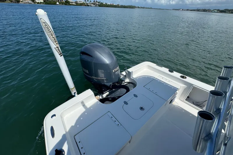 Slide: The Image of 2016 Sea Hunt BX 20 BR boat with Yamaha engine on calm water. - 13