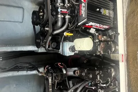 Slide: The Image of Engine compartment of 2000 Sea Ray 270 Sundancer with Mercury components. - 21