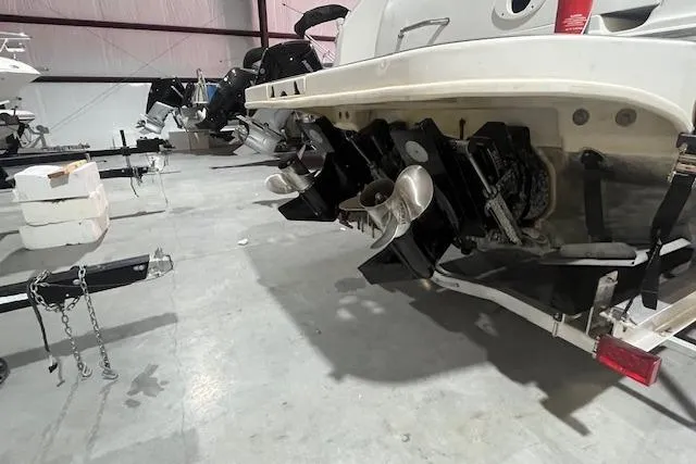 Slide: The Image of Rear view of a 2000 Sea Ray 270 Sundancer boat in a storage facility. - 22