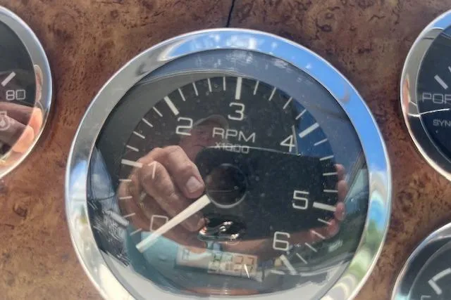 Slide: The Image of Tachometer of 2000 Sea Ray 270 Sundancer boat, showing RPM gauge. - 6
