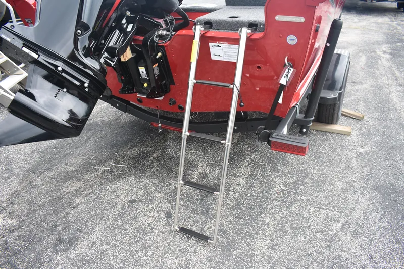 Slide: The Image of Rear view of 2026 Lund 1775 Adventure Sport boat with ladder and motor. - 6