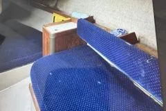 Slide: The Image of Interior seating of a 1986 O'Day 272 sailboat with blue upholstery. - 4