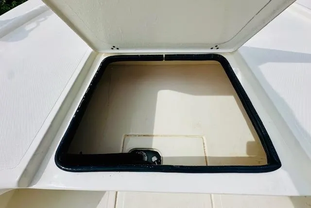 Slide: The Image of Open storage compartment on 2023 Mako 18 LTS boat, showcasing interior space. - 19