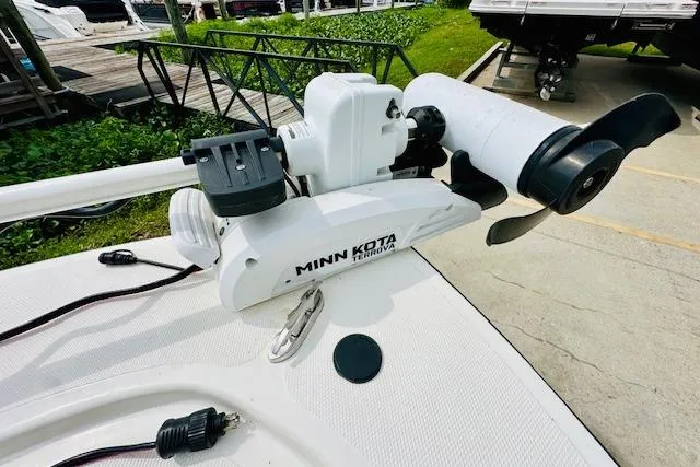 Slide: The Image of 2023 Mako 18 LTS boat with Minn Kota trolling motor on deck. - 20