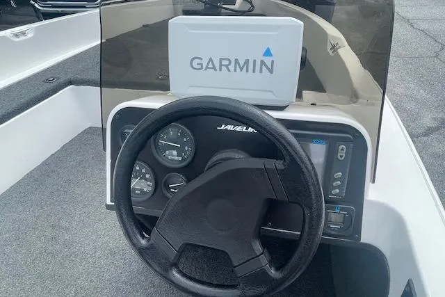 Slide: The Image of Steering console of a 1996 Javelin 369SE boat with Garmin navigation system. - 10
