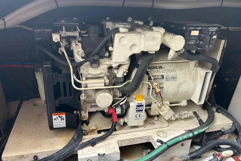Slide: The Image of Engine compartment of a 2005 Sea Ray 260 Sundancer with Kohler power system. - 22