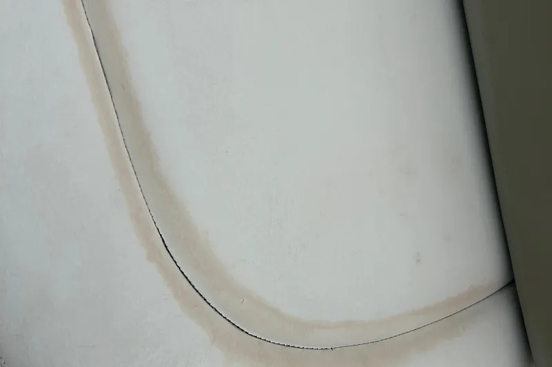 Slide: The Image of Close-up of a 2005 Sea Ray 260 Sundancer boat surface detail. - 28