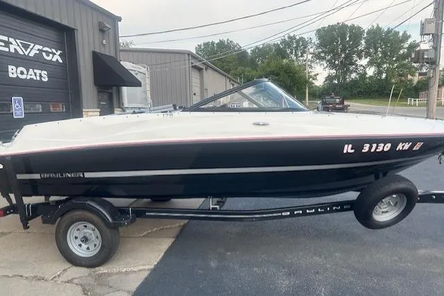 Slide: The Image of 2016 Bayliner 175 Bowrider boat on trailer outside dealership. - 1