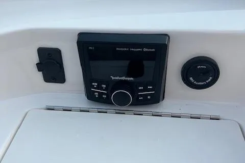 Slide: The Image of 2016 Bayliner 175 Bowrider dashboard with stereo system and controls. - 12