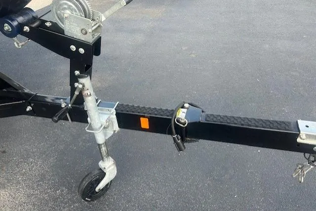 Slide: The Image of Trailer hitch of a 2016 Bayliner 175 Bowrider on asphalt surface. - 16