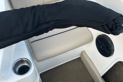 Slide: The Image of 2016 Bayliner 175 Bowrider interior with speaker and cup holder. - 5