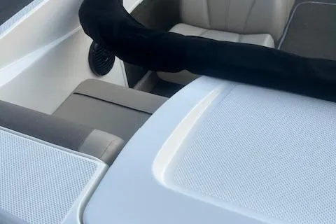 Slide: The Image of 2016 Bayliner 175 Bowrider interior with seating and speaker detail. - 6