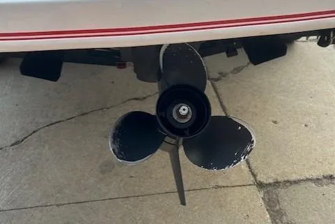 Slide: The Image of 2016 Bayliner 175 Bowrider boat propeller on concrete surface. - 7