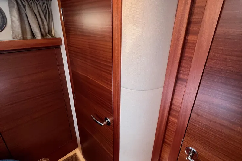 Slide: The Image of Interior of 2018 Nimbus 365 Coupe featuring wooden doors and elegant curtains. - 138