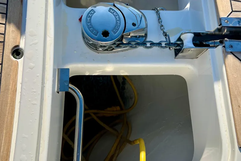 Slide: The Image of Anchor chain compartment on 2018 Nimbus 365 Coupe boat, featuring Lewmar windlass. - 26