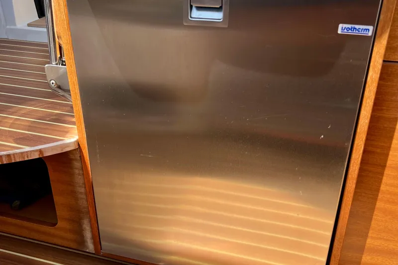 Slide: The Image of Stainless steel appliance on 2018 Nimbus 365 Coupe boat with wooden interior detailing. - 109