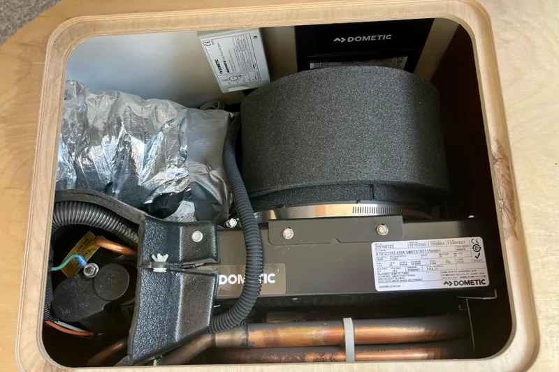 Slide: The Image of Dometic air conditioning unit inside 2018 Nimbus 365 Coupe boat. - 126