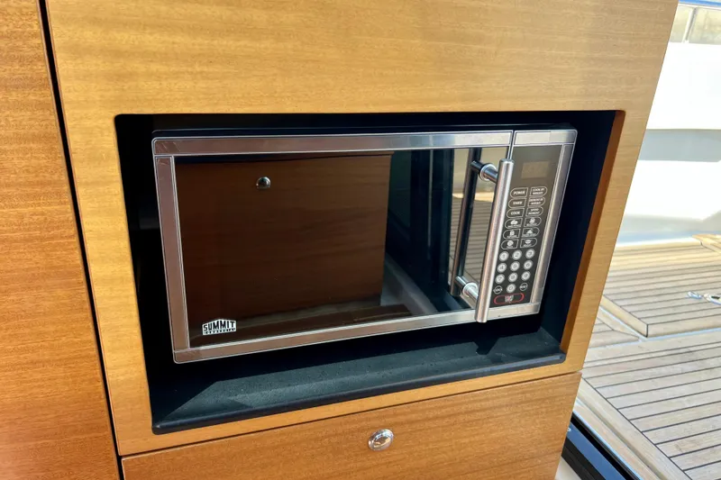 Slide: The Image of Built-in microwave in 2018 Nimbus 365 Coupe yacht kitchen. - 112