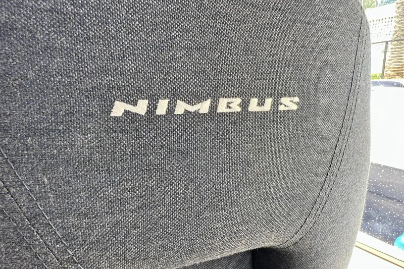 Slide: The Image of Close-up of Nimbus 365 Coupe 2018 seat with logo on textured fabric. - 103