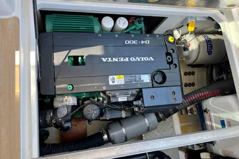 Slide: The Image of Engine compartment of a 2018 Nimbus 365 Coupe featuring a Volvo Penta D4-300 engine. - 56