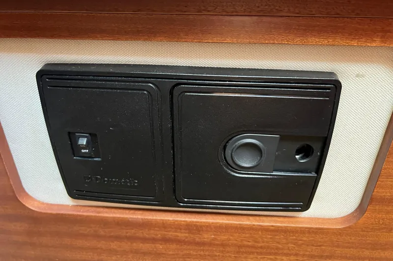 Slide: The Image of Control panel in 2018 Nimbus 365 Coupe boat interior. - 152