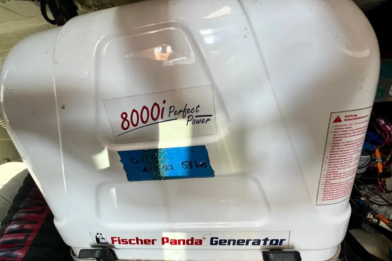 Slide: The Image of Fischer Panda 8000i generator in a 2018 Nimbus 365 Coupe boat. - 65