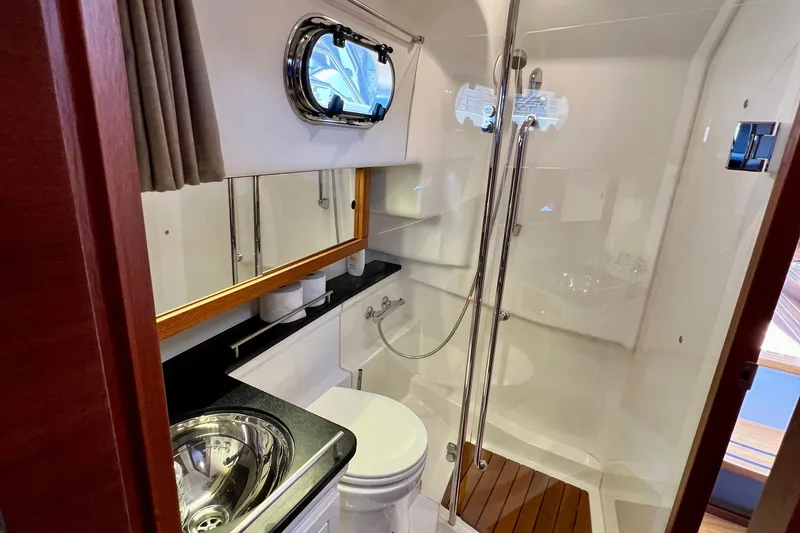 Slide: The Image of Luxurious bathroom in 2018 Nimbus 365 Coupe yacht with modern fixtures and shower. - 140