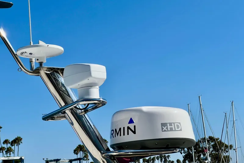 Slide: The Image of Radar equipment on a 2018 Nimbus 365 Coupe against a clear blue sky. - 32