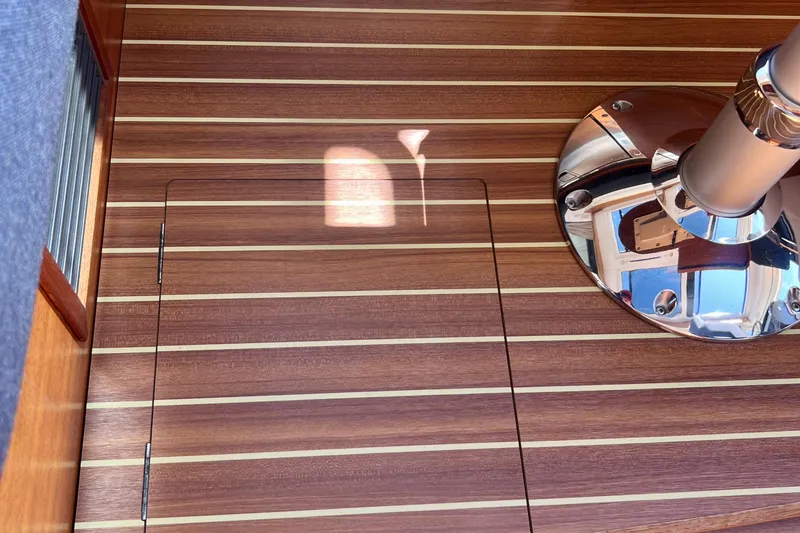 Slide: The Image of Teak deck of 2018 Nimbus 365 Coupe with polished metal fixture. - 122
