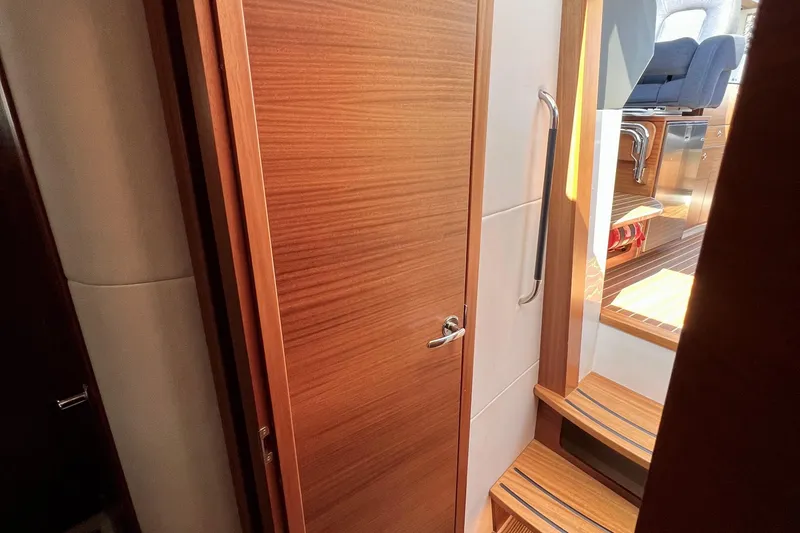 Slide: The Image of Interior of 2018 Nimbus 365 Coupe, featuring wooden door and steps. - 141