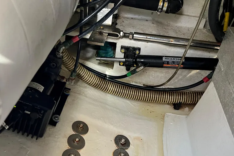 Slide: The Image of Engine compartment of 2018 Nimbus 365 Coupe with hydraulic steering components. - 68