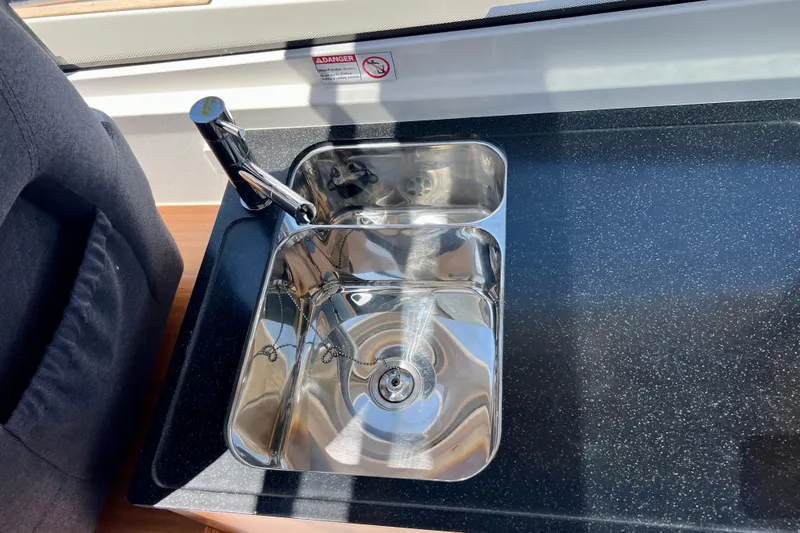 Slide: The Image of Stainless steel sink in 2018 Nimbus 365 Coupe boat kitchen. - 108