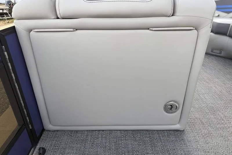 Slide: The Image of 2025 Barletta 23UC boat seat with storage compartment and lock. - 15