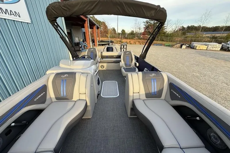 Slide: The Image of 2025 Barletta 23UC pontoon boat interior with luxurious seating and modern design. - 33