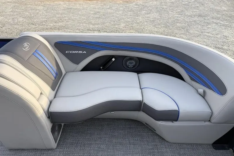 Slide: The Image of Luxurious seating in 2025 Barletta 23UC boat, featuring sleek gray and blue design. - 7