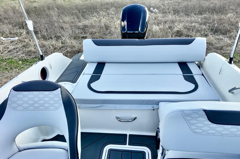 Slide: The Image of 2026 Bayliner Element M19 boat interior with modern seating and sleek design. - 6