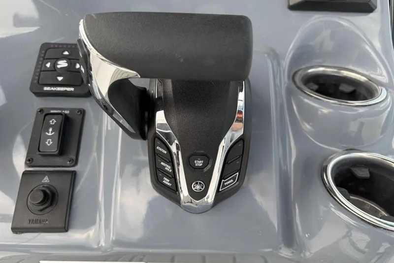 Slide: The Image of Control panel of 2026 Tidewater 232 CC Adventure boat with Yamaha throttle. - 14