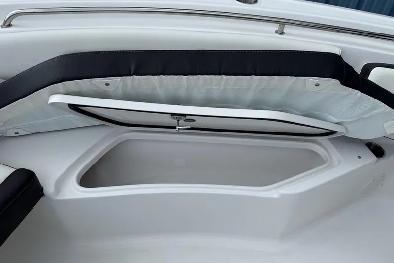 Slide: The Image of Open storage compartment on 2026 Tidewater 232 CC Adventure boat. - 5