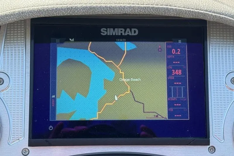Slide: The Image of Simrad navigation display showing Osage Beach map on a 2020 Crest Caribbean LX 250 SLC. - 9