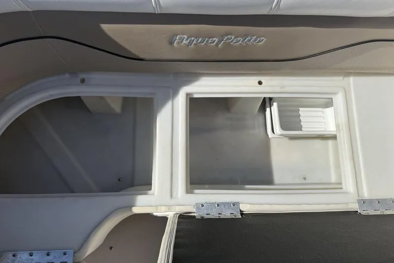 Slide: The Image of Interior compartments of a 2002 Godfrey Aqua Patio AP220RS boat. - 11