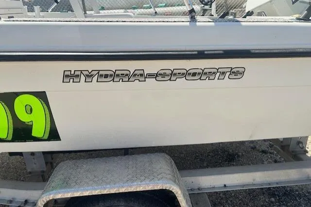 Slide: The Image of 2000 Hydra-Sports 175 boat side view with logo and trailer. - 10