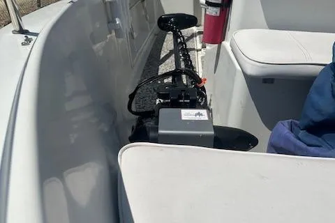 Slide: The Image of 2000 Hydra-Sports 175 boat interior with motor and seating. - 6