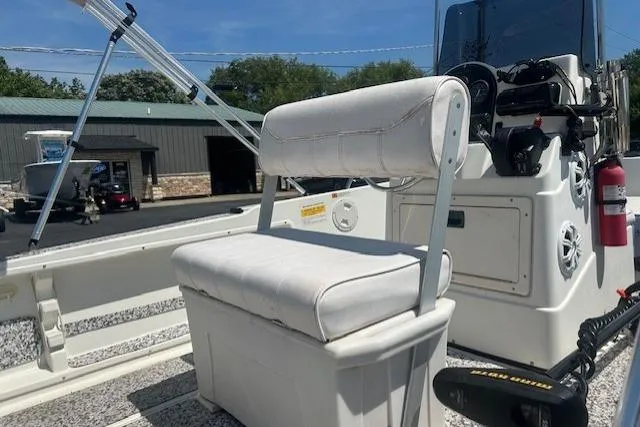 Slide: The Image of 2000 Hydra-Sports 175 boat interior with white seating and control panel. - 8