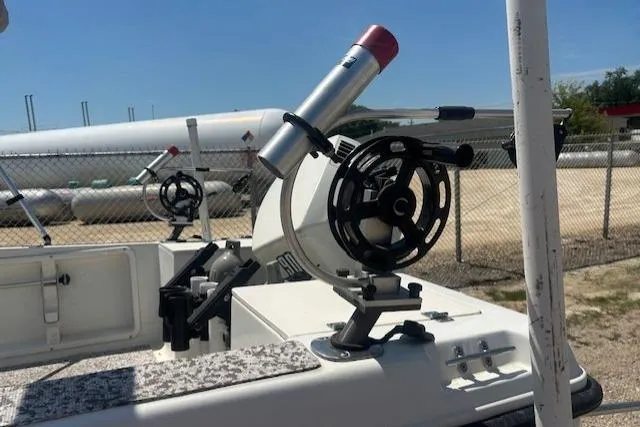 Slide: The Image of Hydra-Sports 175 boat, 2000 model, featuring fishing rod holders and equipment on deck. - 9