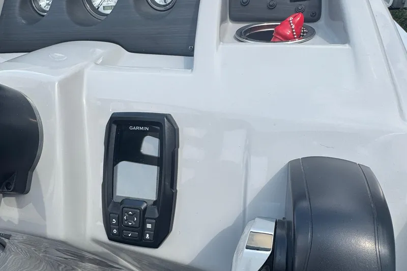 Slide: The Image of Dashboard of 2023 Bennington 20 SL boat with Garmin device and gauges. - 13