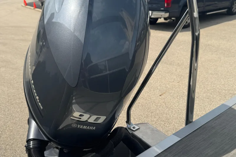 Slide: The Image of Yamaha 90 horsepower outboard motor on 2023 Bennington 20 SL boat. - 27
